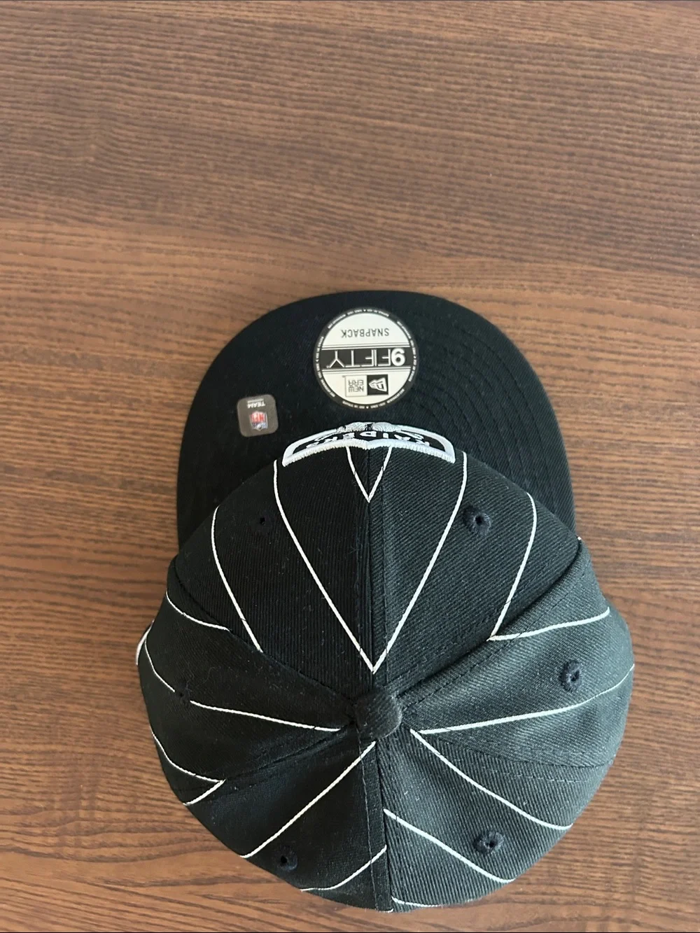 New Era Black & White Raiders Pinstripe Snapback Hat